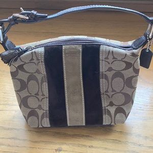 Small coach clutch purse